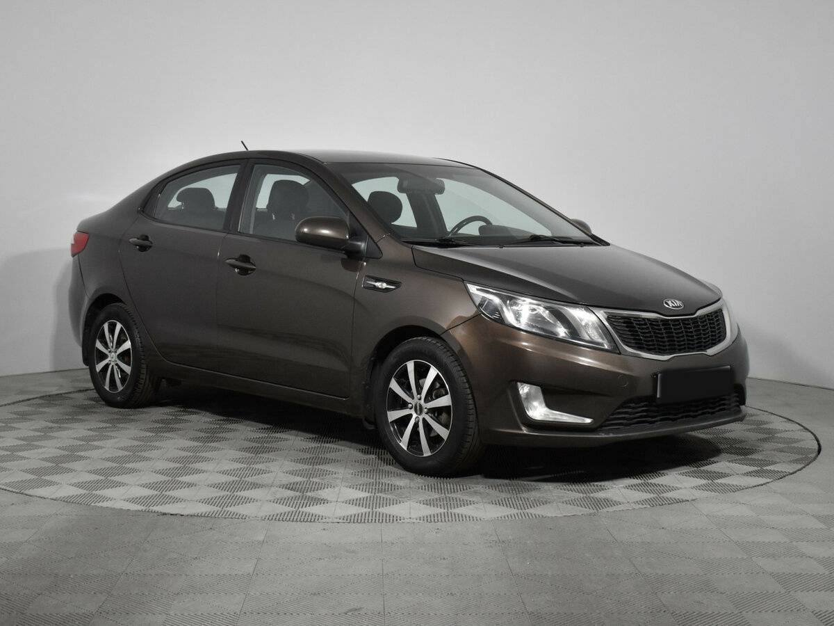 Kia Rio с пробегом — 2014 год. Фото: #2