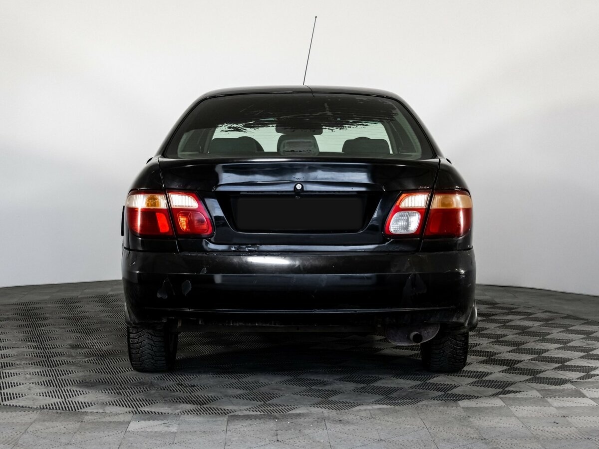 Nissan Almera с пробегом — 2005 год. Фото: #4