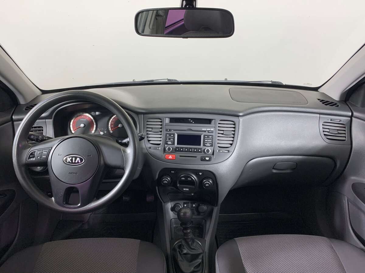Kia Rio с пробегом — 2010 год. Фото: #11