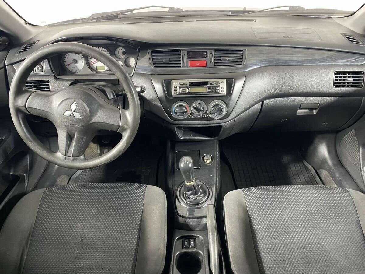 Mitsubishi Lancer с пробегом — 2006 год. Фото: #9