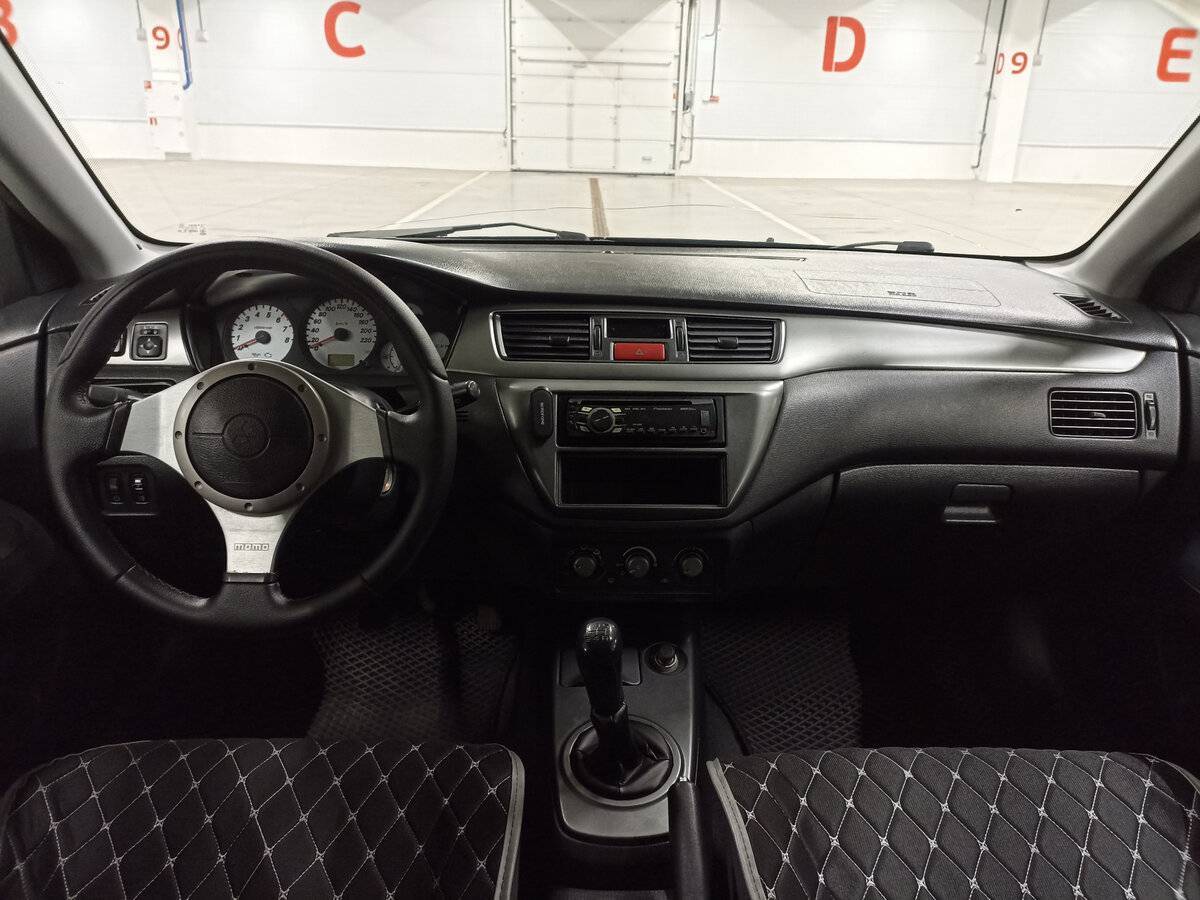 Mitsubishi Lancer с пробегом — 2006 год. Фото: #13