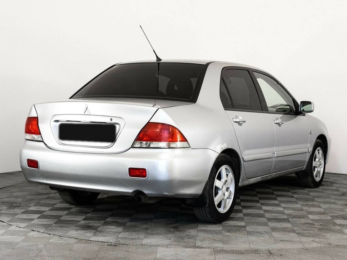 Mitsubishi Lancer с пробегом — 2006 год. Фото: #4