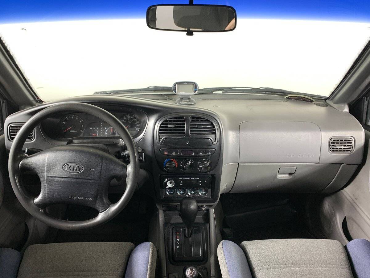 Kia Sportage с пробегом — 2003 год. Фото: #11