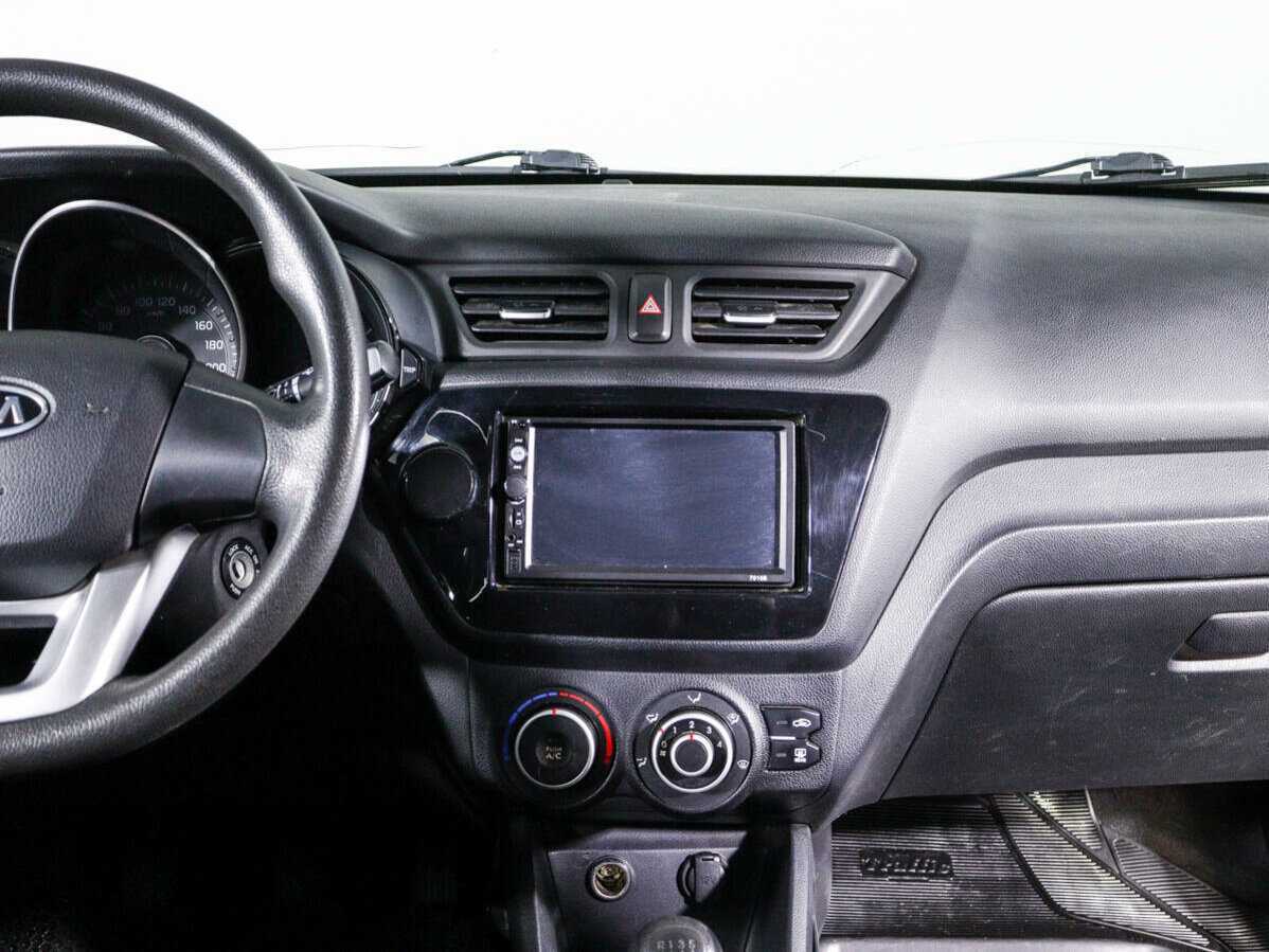 Kia Rio с пробегом — 2012 год. Фото: #7