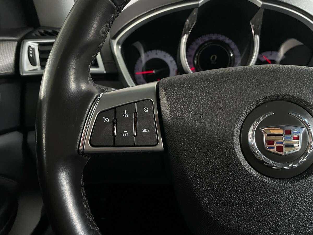 Cadillac SRX с пробегом — 2010 год. Фото: #10