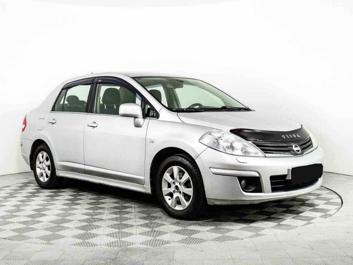 Nissan Tiida с пробегом — 2011 год. Фото: #2
