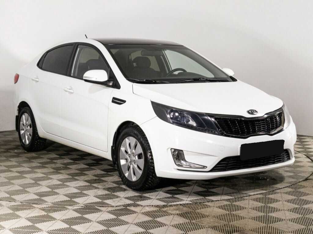 Kia Rio с пробегом — 2011 год. Фото: #2