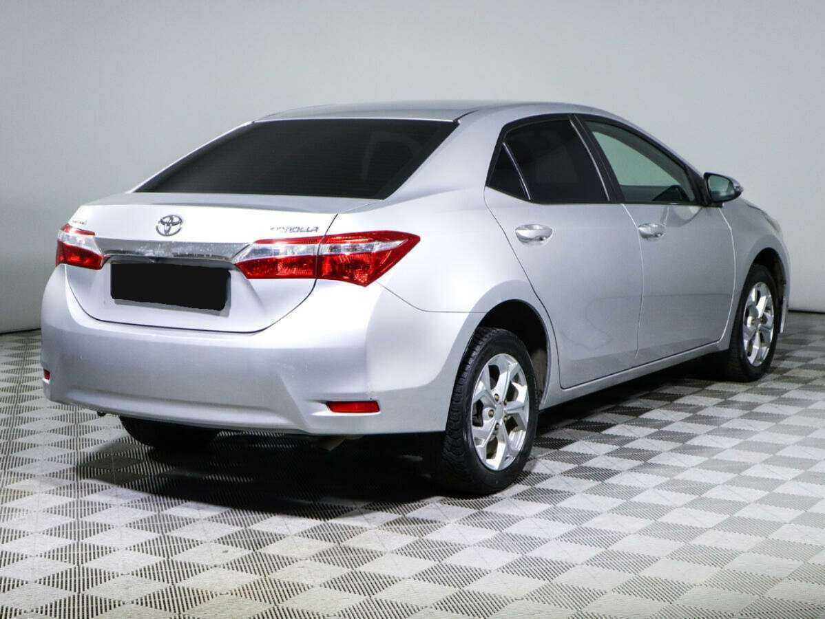 Toyota Corolla с пробегом — 2013 год. Фото: #2