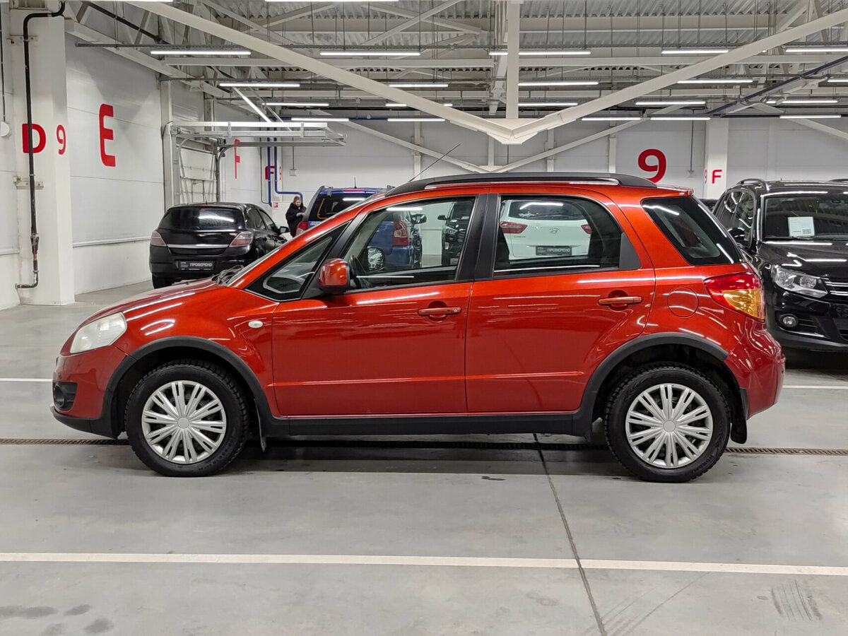 Suzuki SX4 с пробегом — 2011 год. Фото: #7
