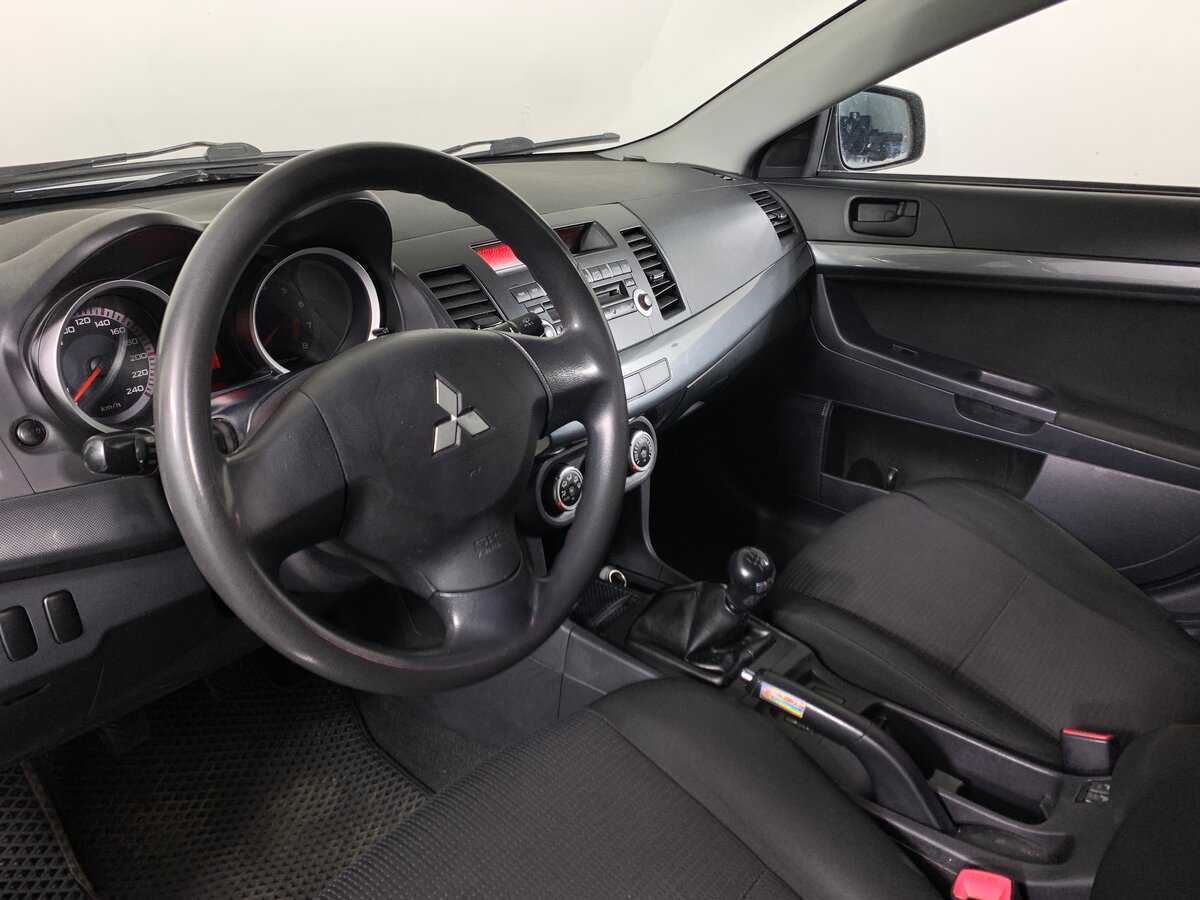 Mitsubishi Lancer с пробегом — 2009 год. Фото: #11