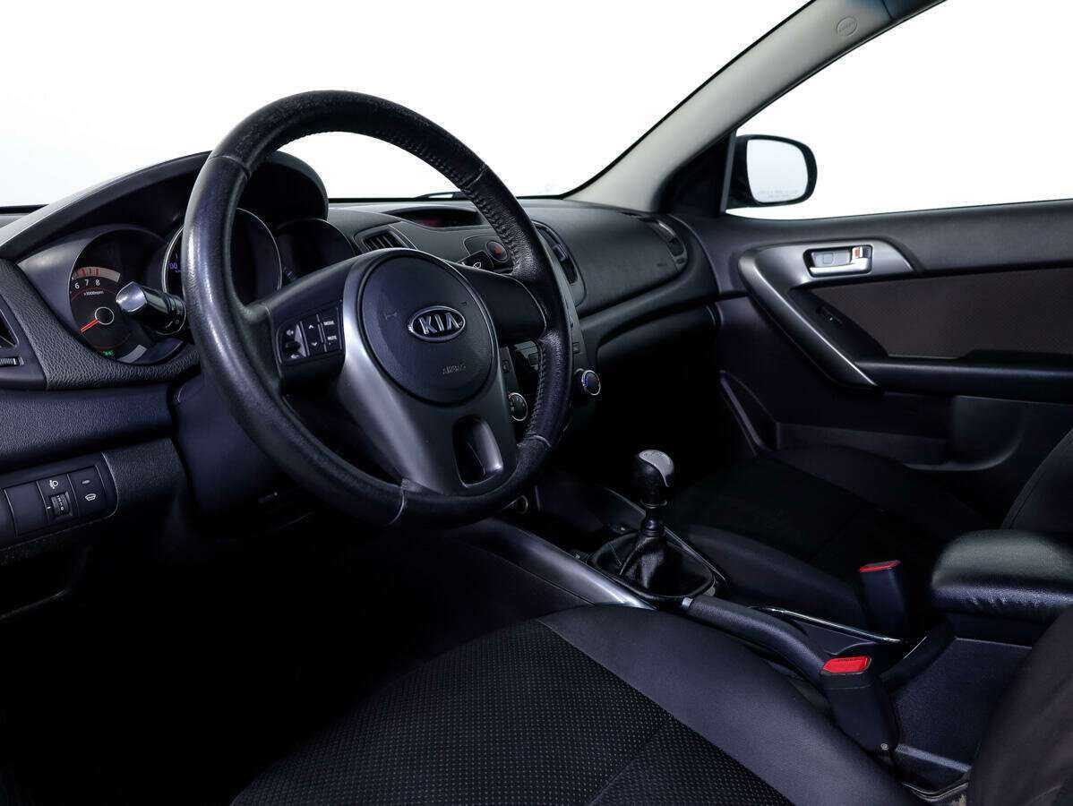 Kia Cerato с пробегом — 2011 год. Фото: #9