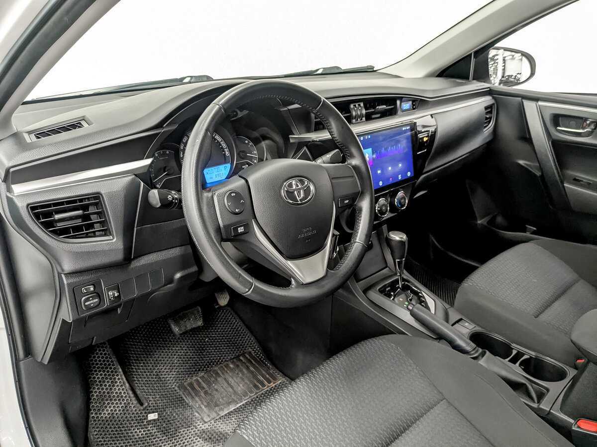 Toyota Corolla с пробегом — 2014 год. Фото: #15