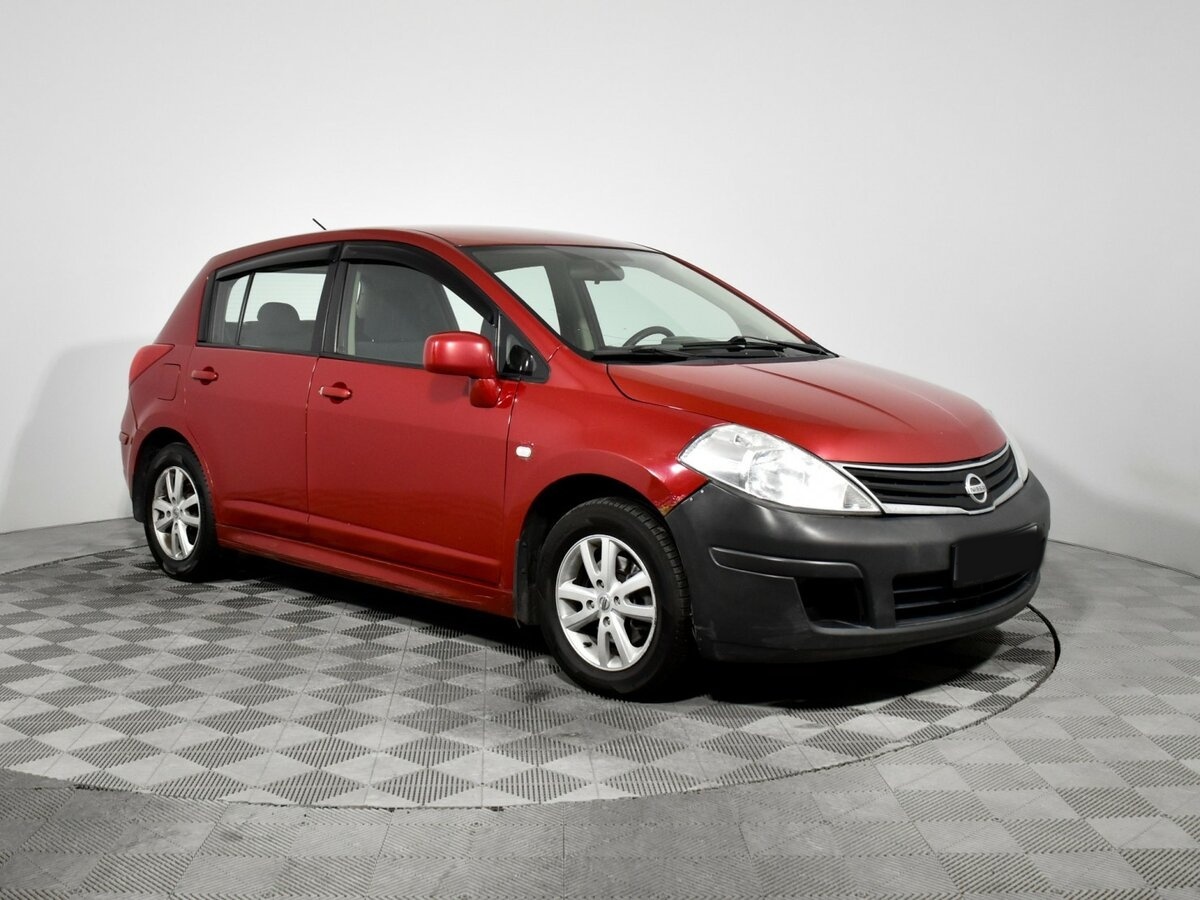 Nissan Tiida с пробегом — 2010 год. Фото: #2