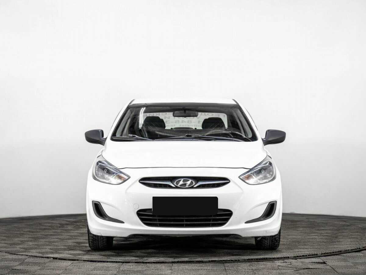 Hyundai Solaris с пробегом — 2013 год. Фото: #1