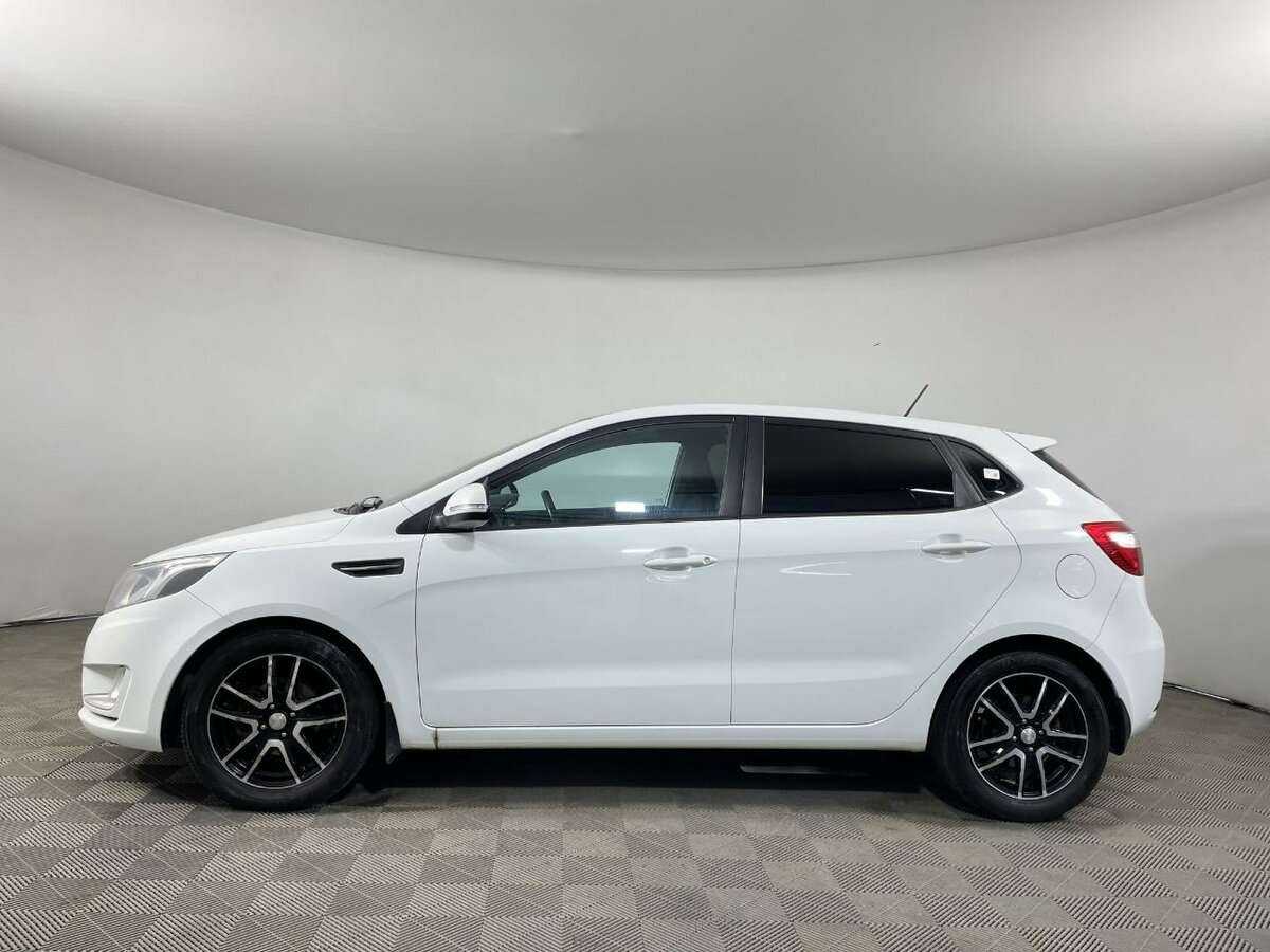 Kia Rio с пробегом — 2013 год. Фото: #4