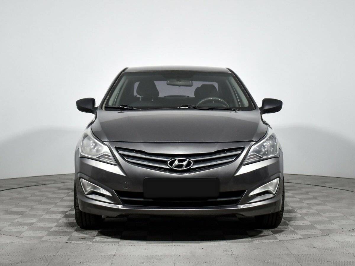 Hyundai Solaris с пробегом — 2014 год. Фото: #1