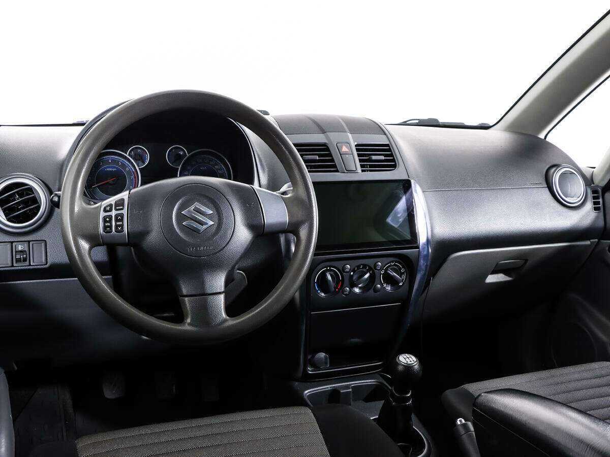 Suzuki SX4 с пробегом — 2013 год. Фото: #10