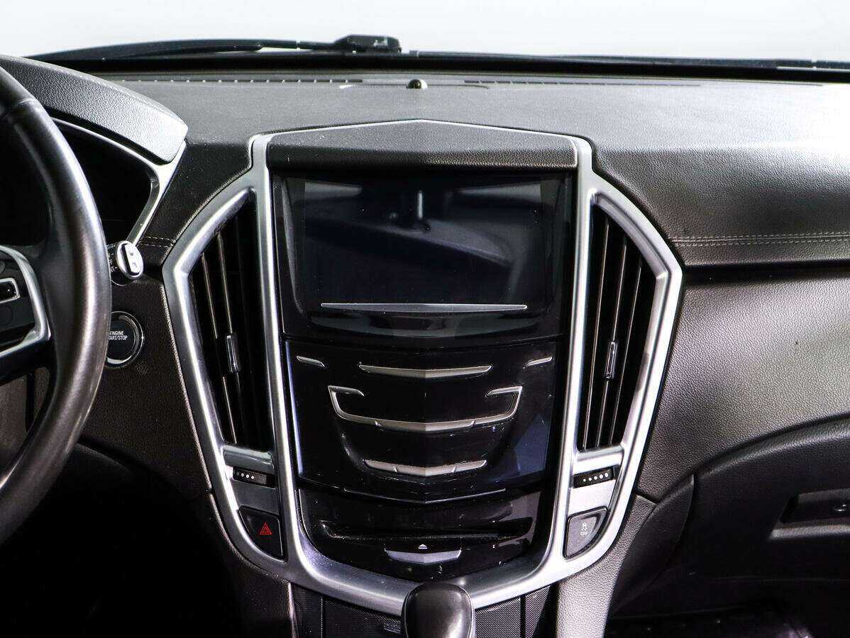 Cadillac SRX с пробегом — 2015 год. Фото: #10