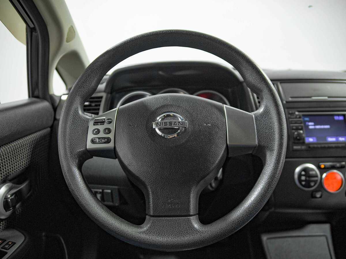 Nissan Tiida с пробегом — 2010 год. Фото: #8