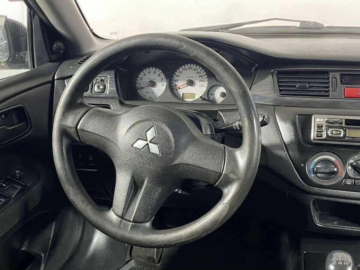 Mitsubishi Lancer с пробегом — 2006 год. Фото: #10