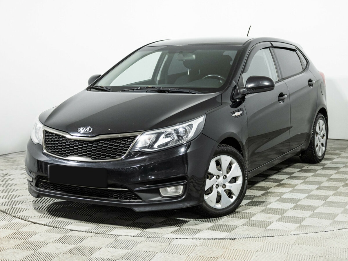 Kia Rio с пробегом — 2015 год. Фото: #0