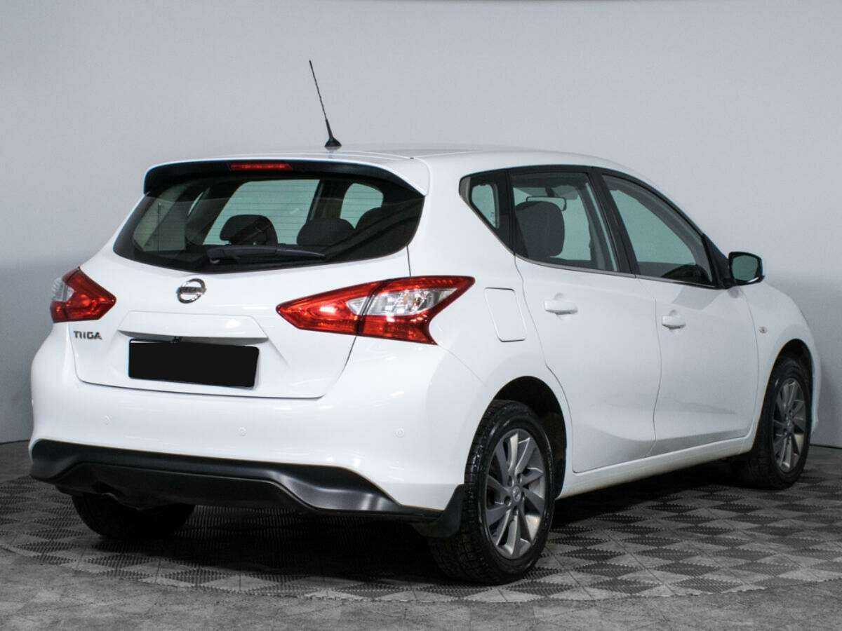 Nissan Tiida с пробегом — 2015 год. Фото: #4