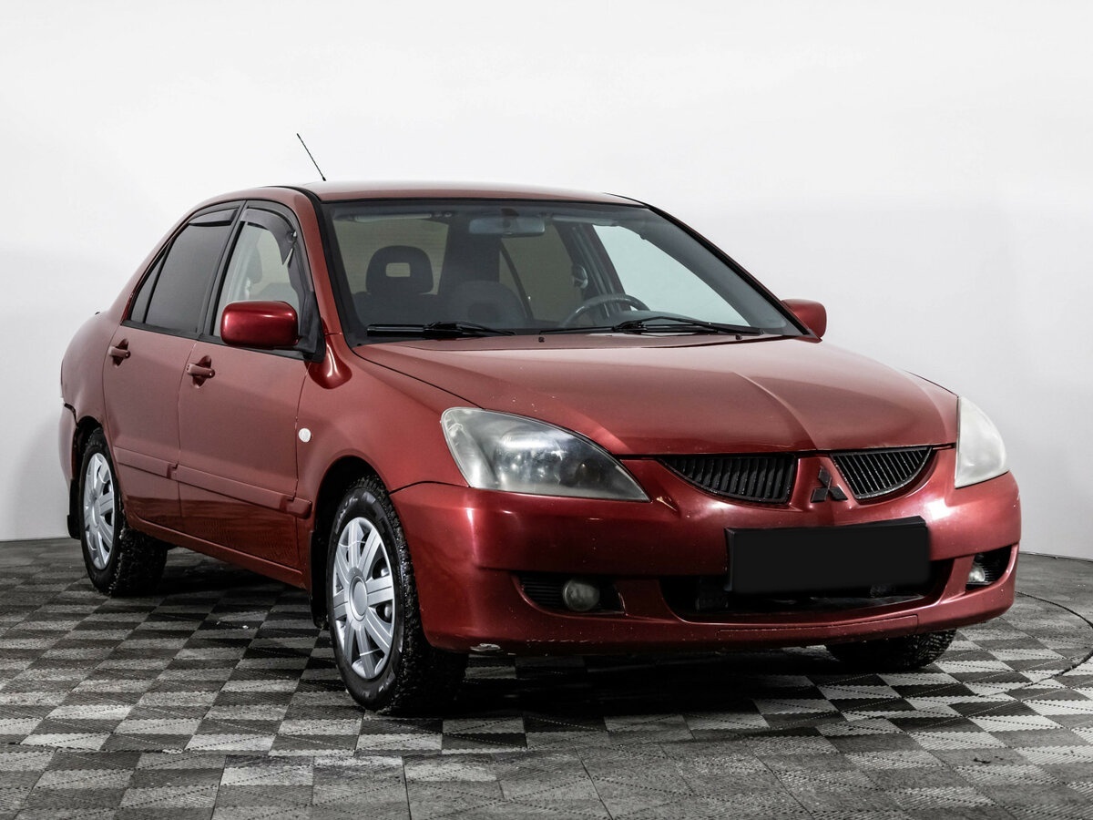 Mitsubishi Lancer с пробегом — 2005 год. Фото: #2