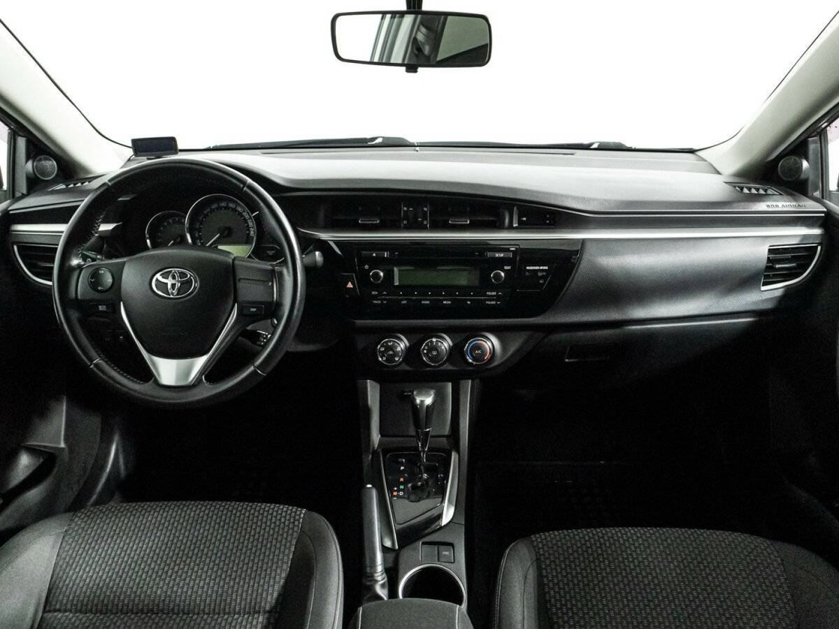 Toyota Corolla с пробегом — 2013 год. Фото: #12