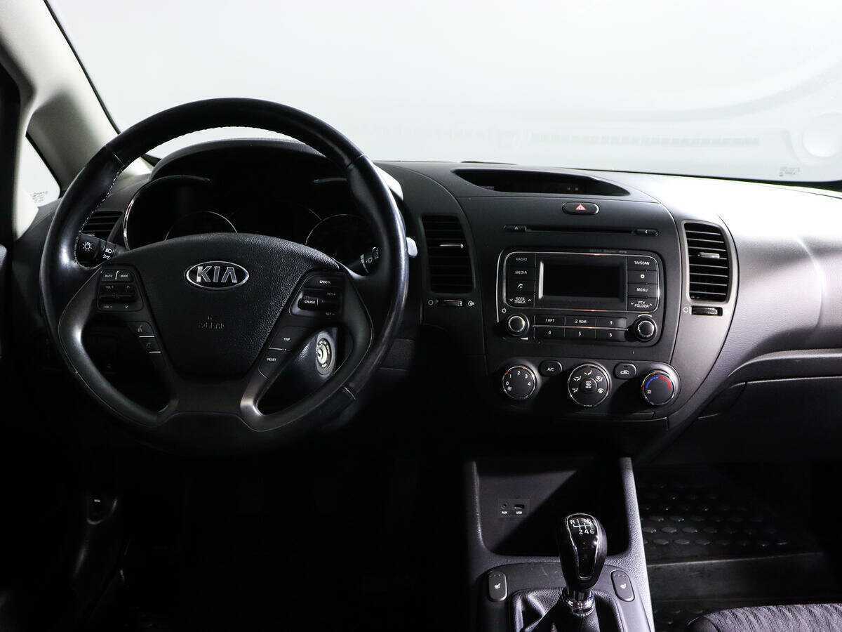 Kia Cerato с пробегом — 2014 год. Фото: #11