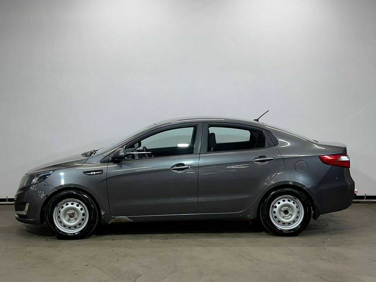 Kia Rio с пробегом — 2013 год. Фото: #7