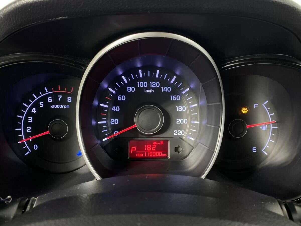 Kia Rio с пробегом — 2013 год. Фото: #11