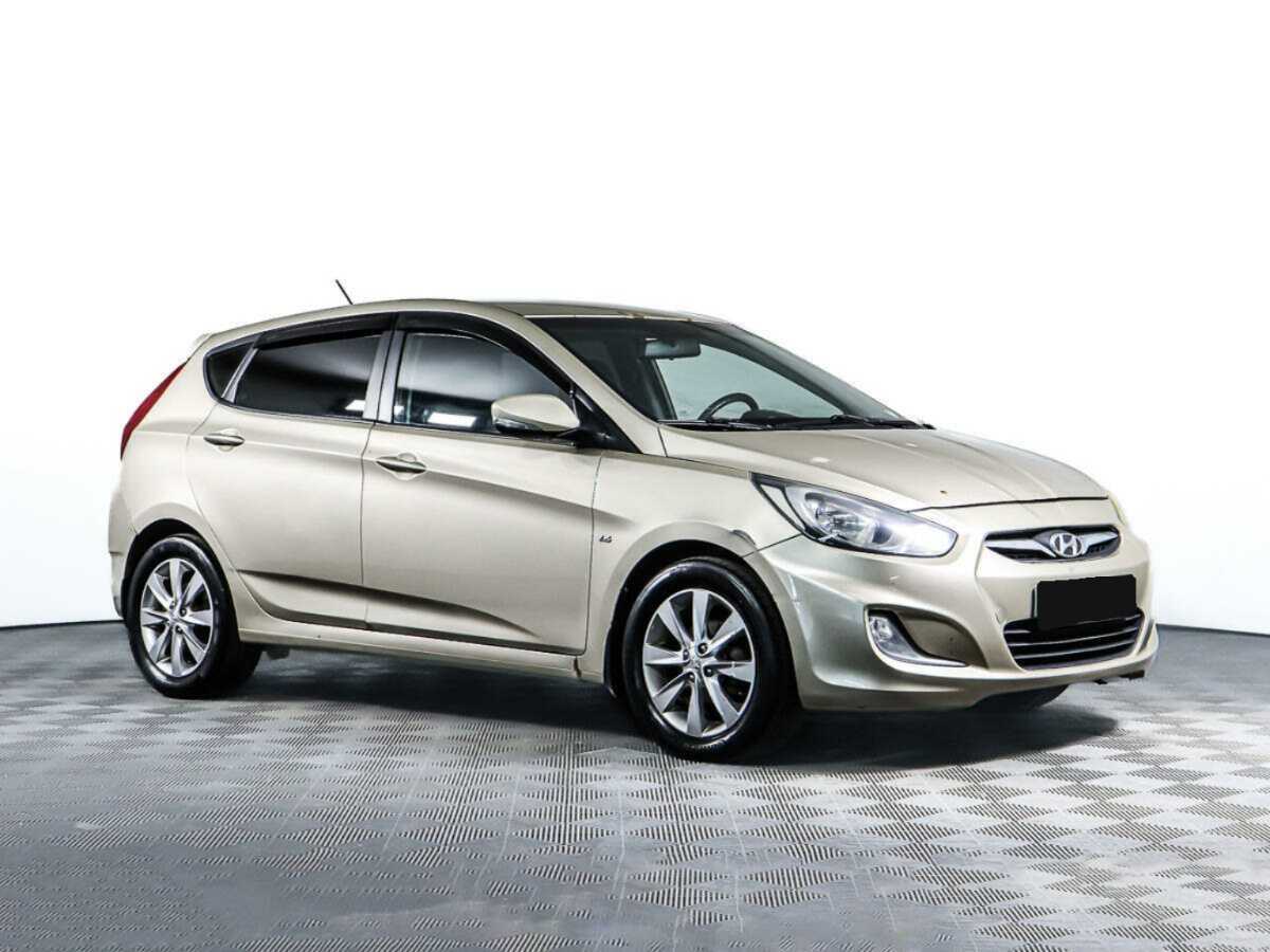 Hyundai Solaris с пробегом — 2012 год. Фото: #1