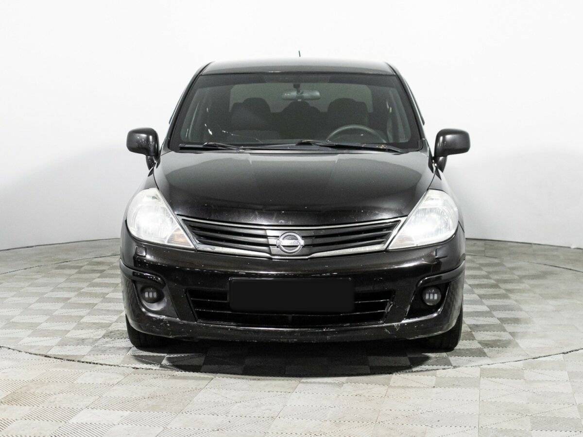 Nissan Tiida с пробегом — 2010 год. Фото: #1