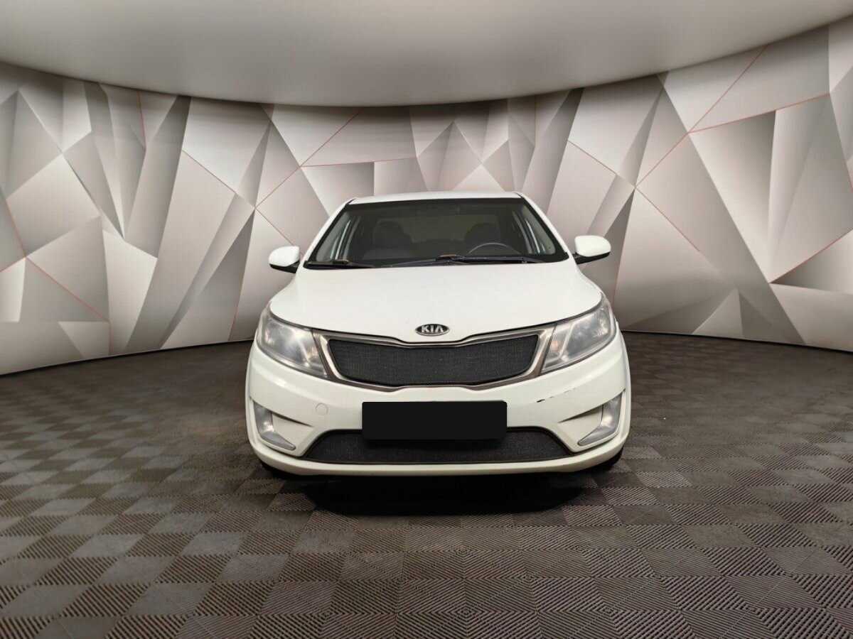Kia Rio с пробегом — 2013 год. Фото: #6
