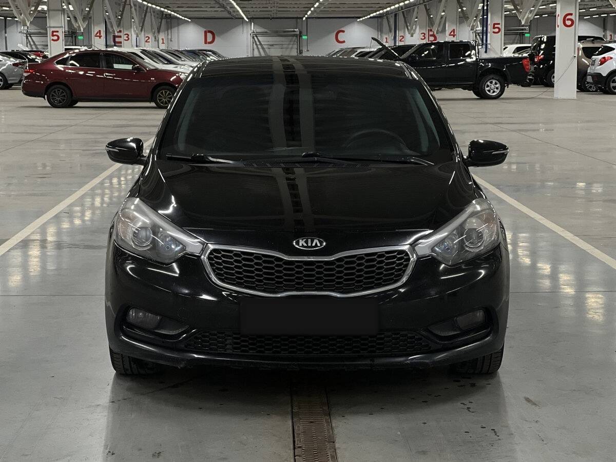 Kia Cerato с пробегом — 2014 год. Фото: #1