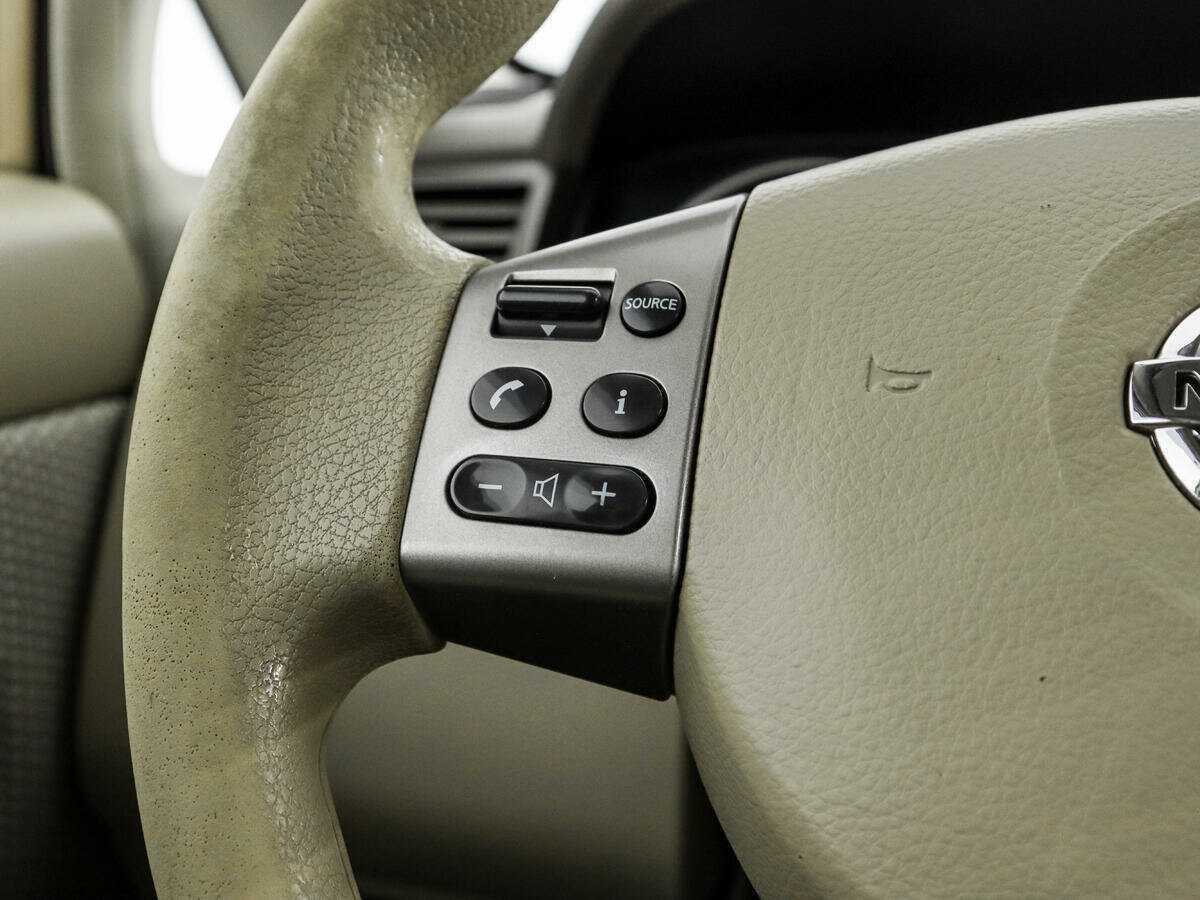 Nissan Tiida с пробегом — 2008 год. Фото: #12