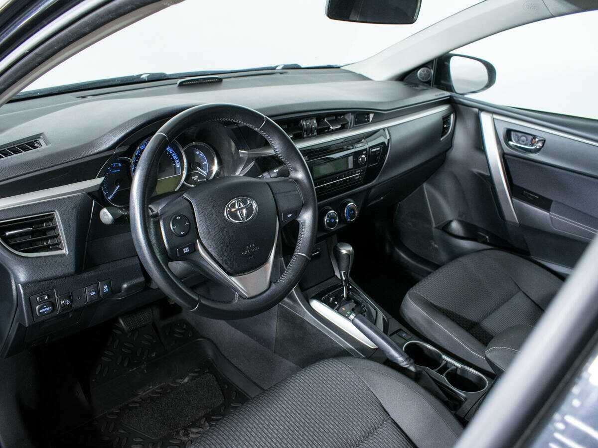 Toyota Corolla с пробегом — 2013 год. Фото: #12