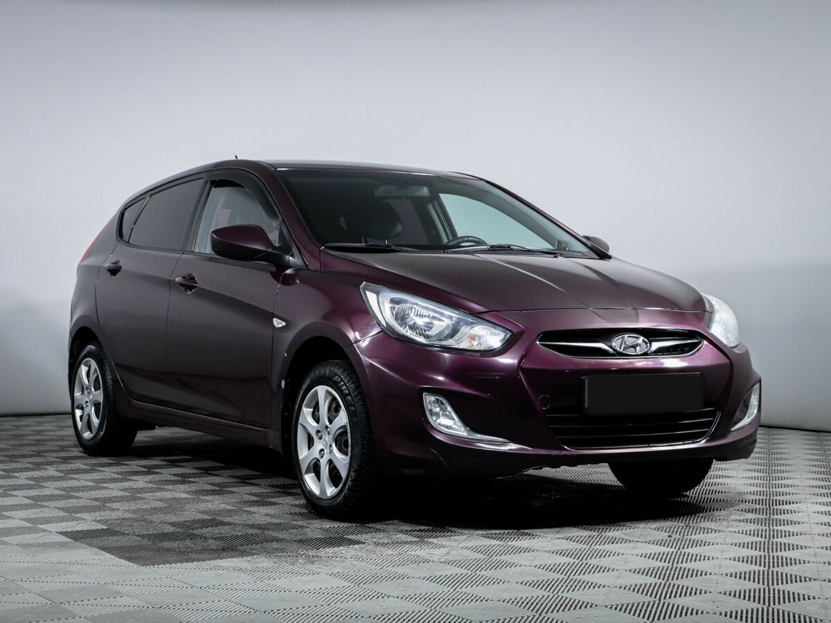 Hyundai Solaris с пробегом — 2013 год. Фото: #2