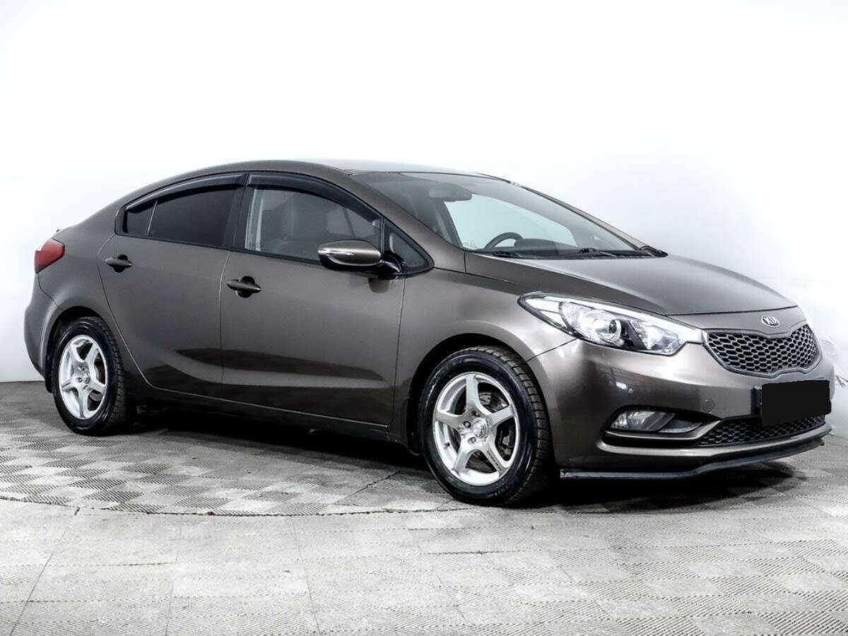 Kia Cerato с пробегом — 2015 год. Фото: #2