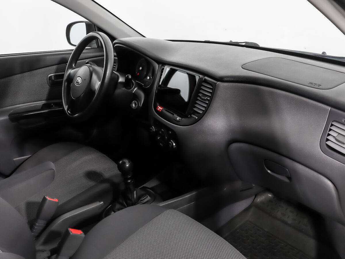 Kia Rio с пробегом — 2011 год. Фото: #10