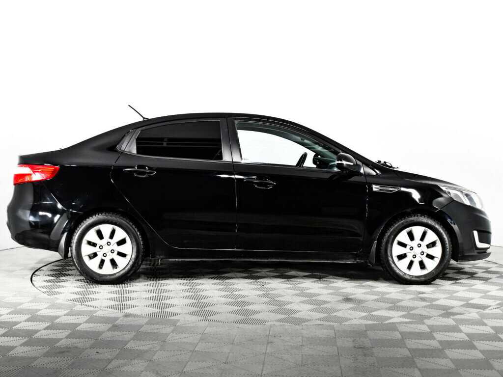 Kia Rio с пробегом — 2014 год. Фото: #3