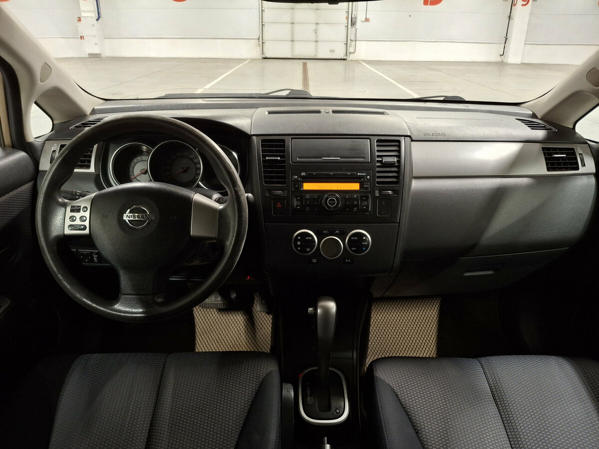 Nissan Tiida с пробегом — 2008 год. Фото: #13