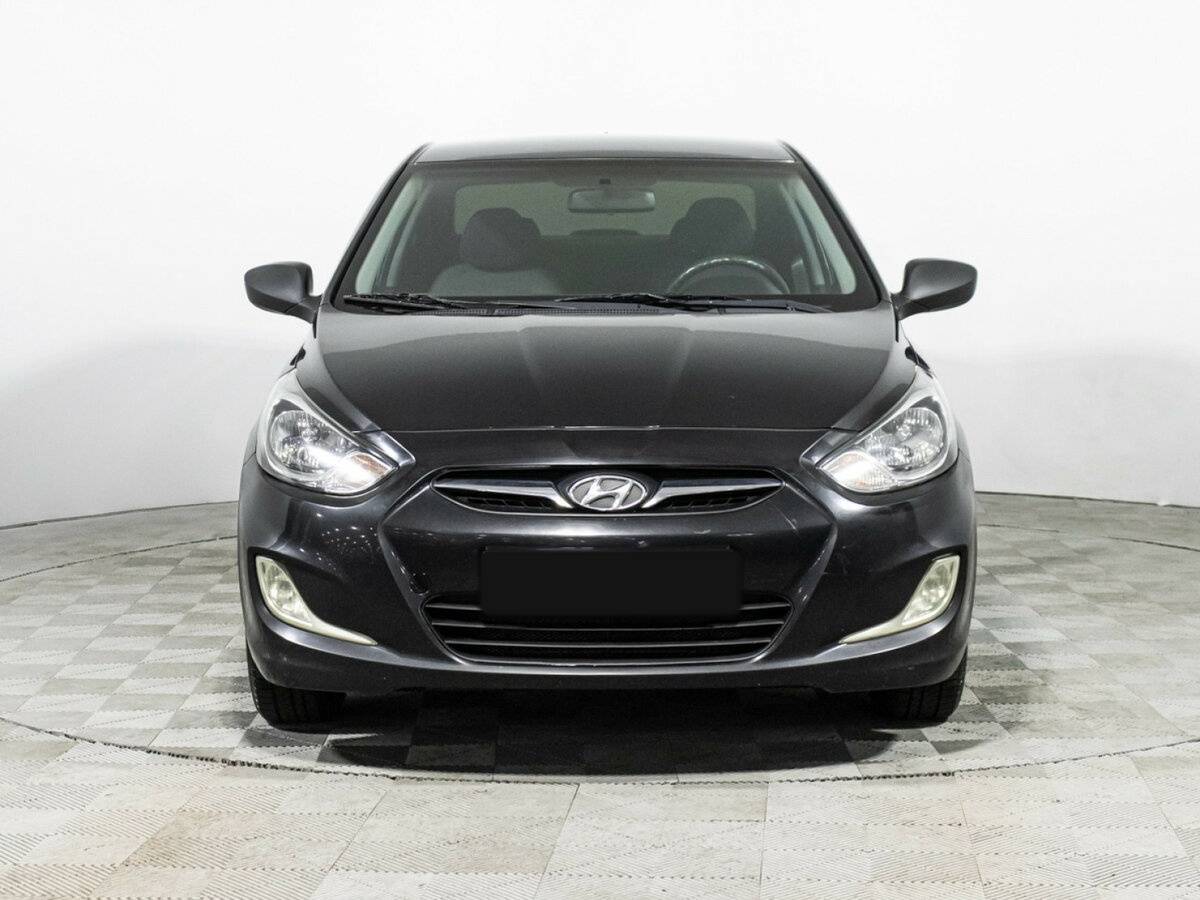 Hyundai Solaris с пробегом — 2011 год. Фото: #1