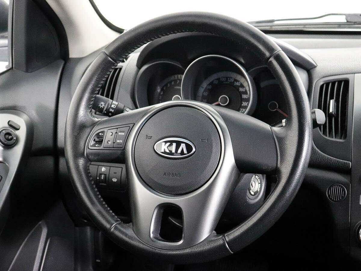 Kia Cerato с пробегом — 2011 год. Фото: #12