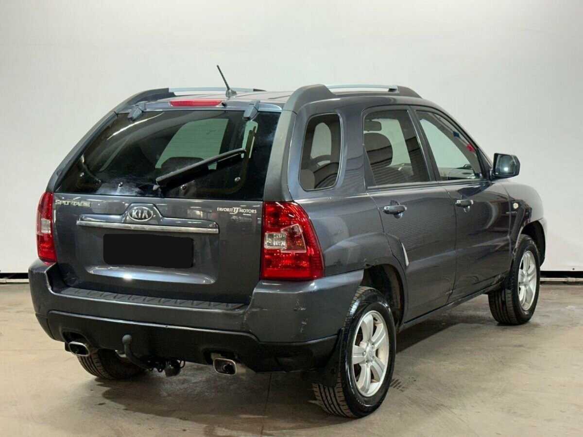 Kia Sportage с пробегом — 2010 год. Фото: #4