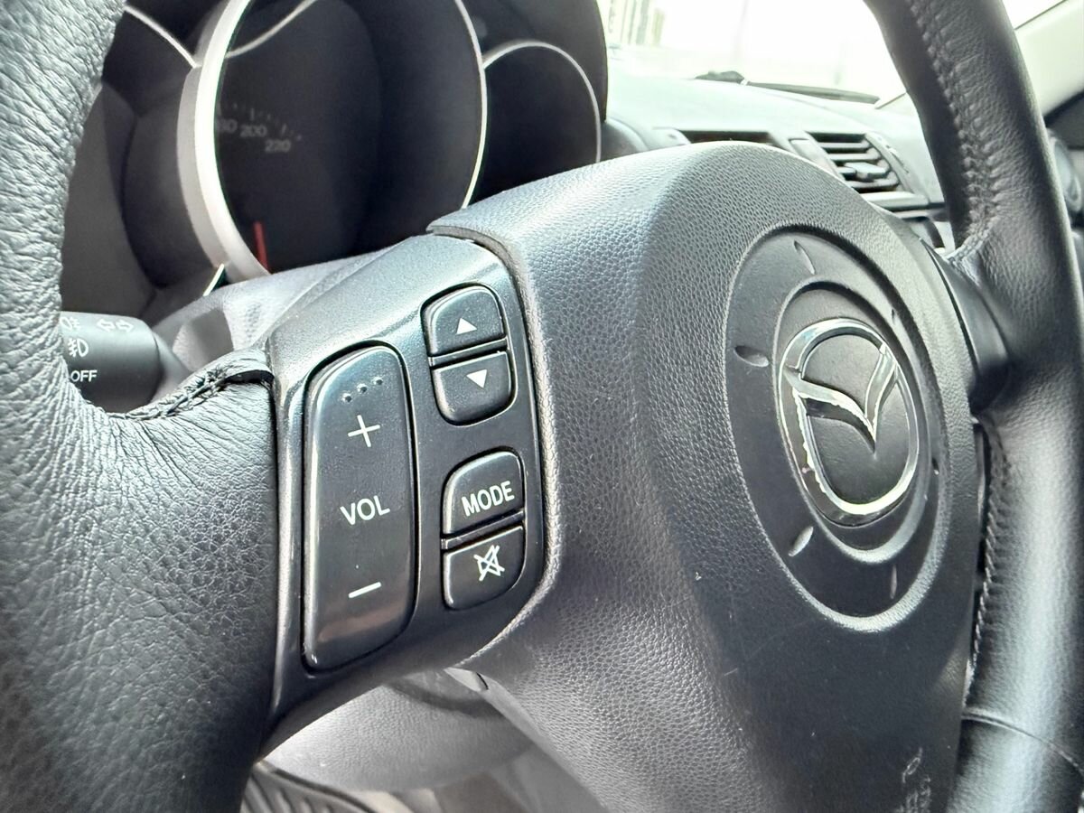 Mazda 3 с пробегом — 2004 год. Фото: #12