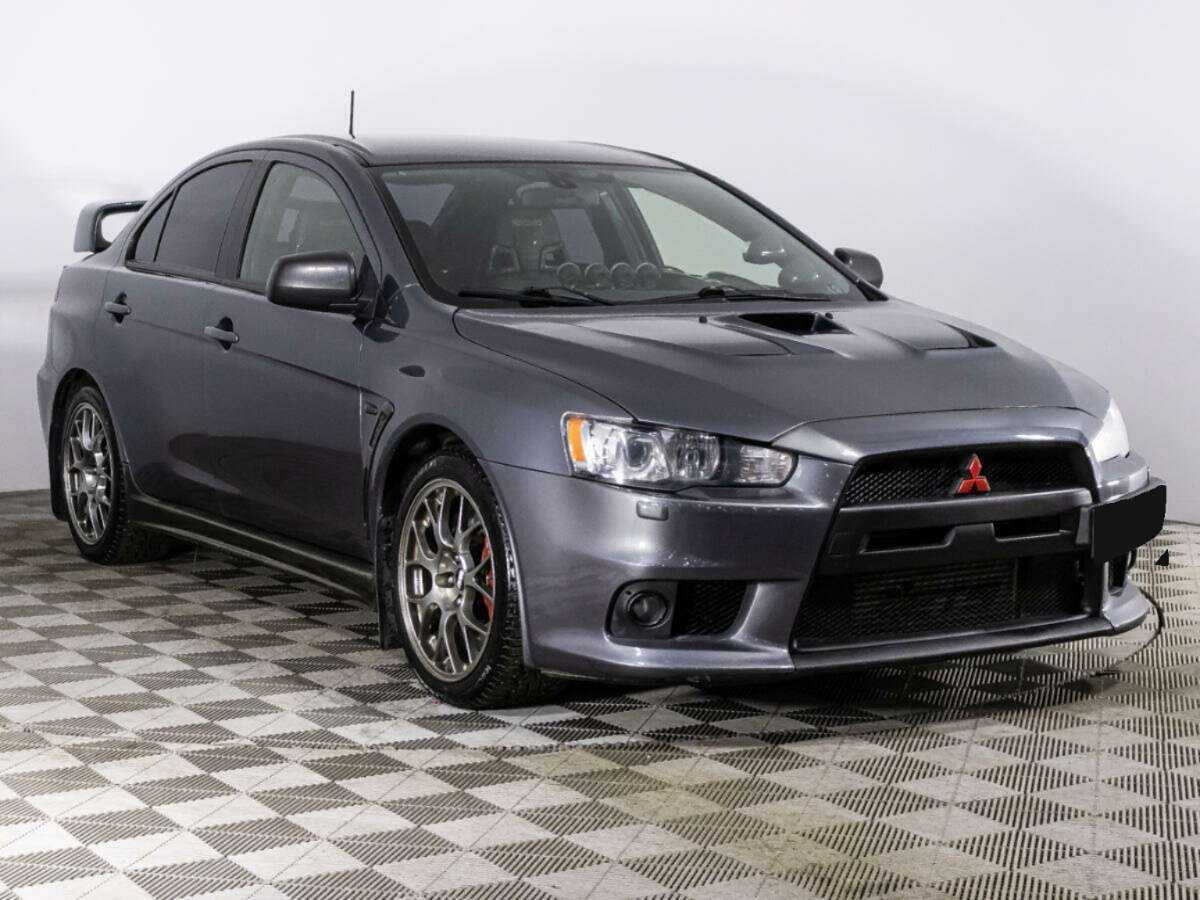 Mitsubishi Lancer Evolution с пробегом — 2011 год. Фото: #2