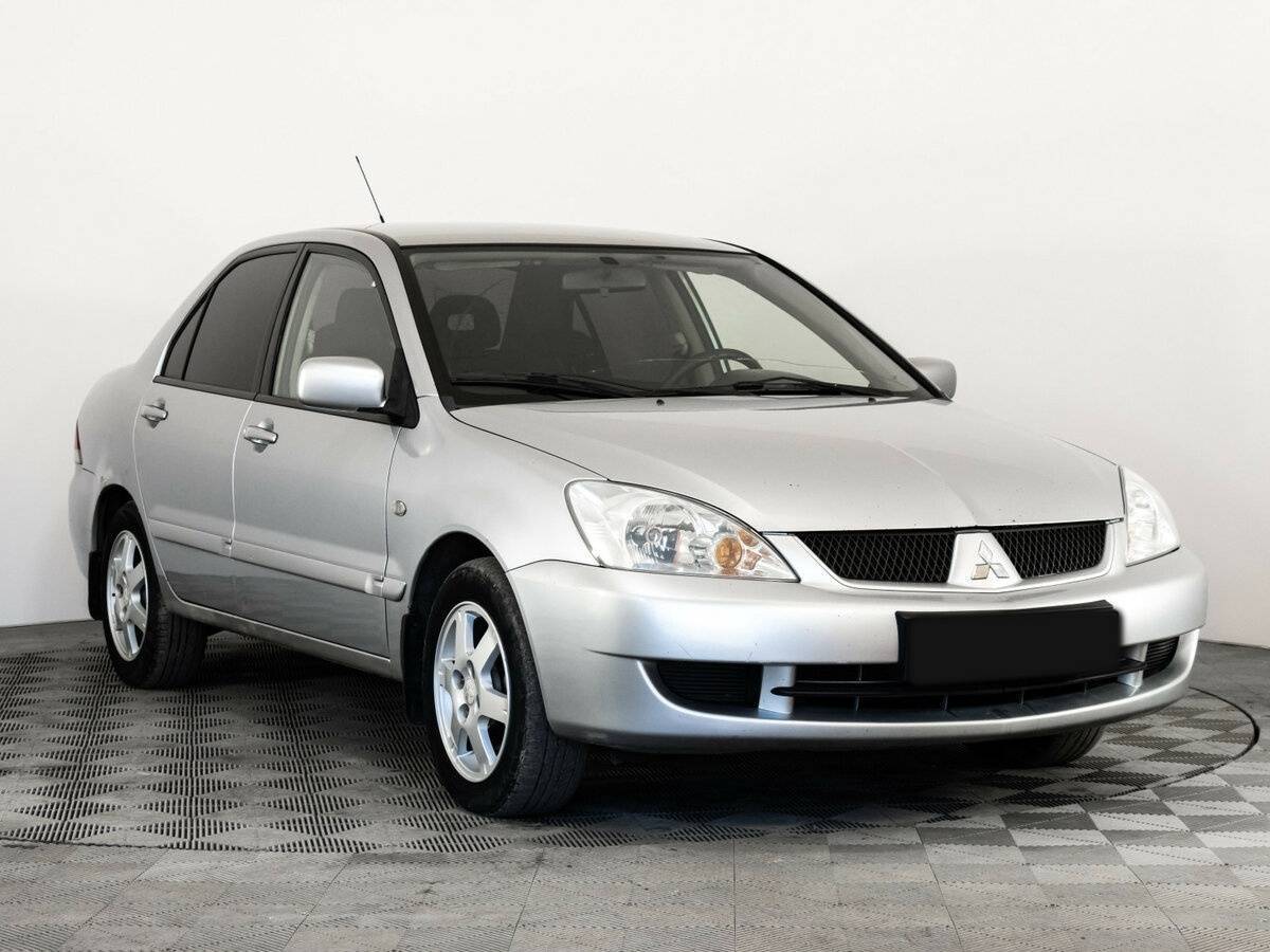 Mitsubishi Lancer с пробегом — 2006 год. Фото: #2