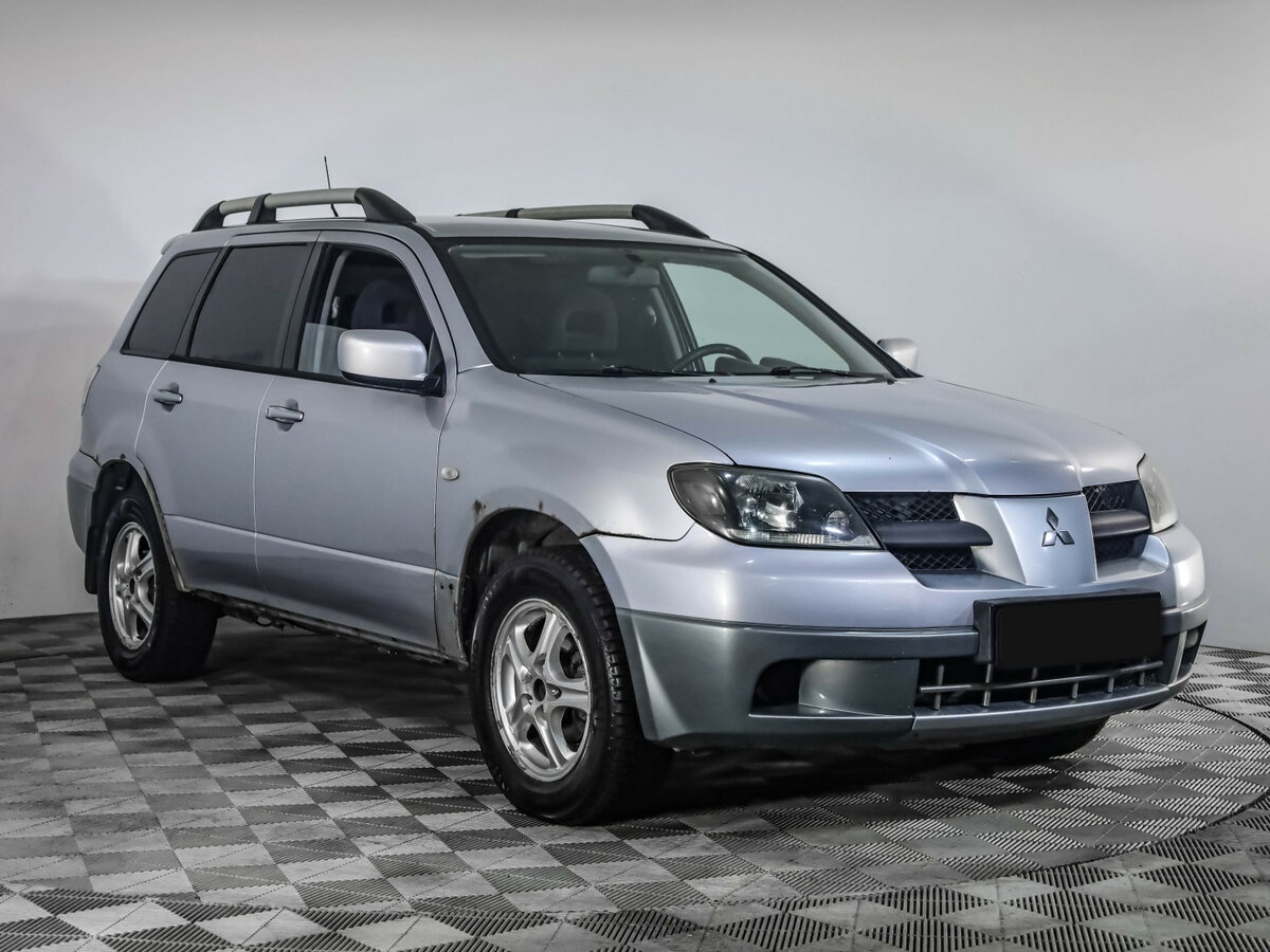Mitsubishi Outlander с пробегом — 2004 год. Фото: #2