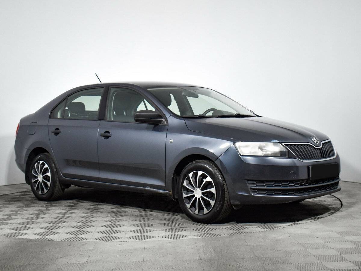 Skoda Rapid с пробегом — 2014 год. Фото: #2